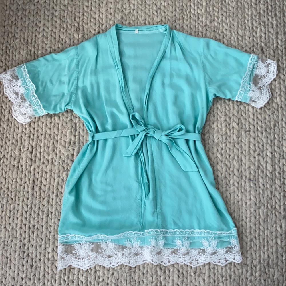 Aqua kids robe with lace edging and tie belt